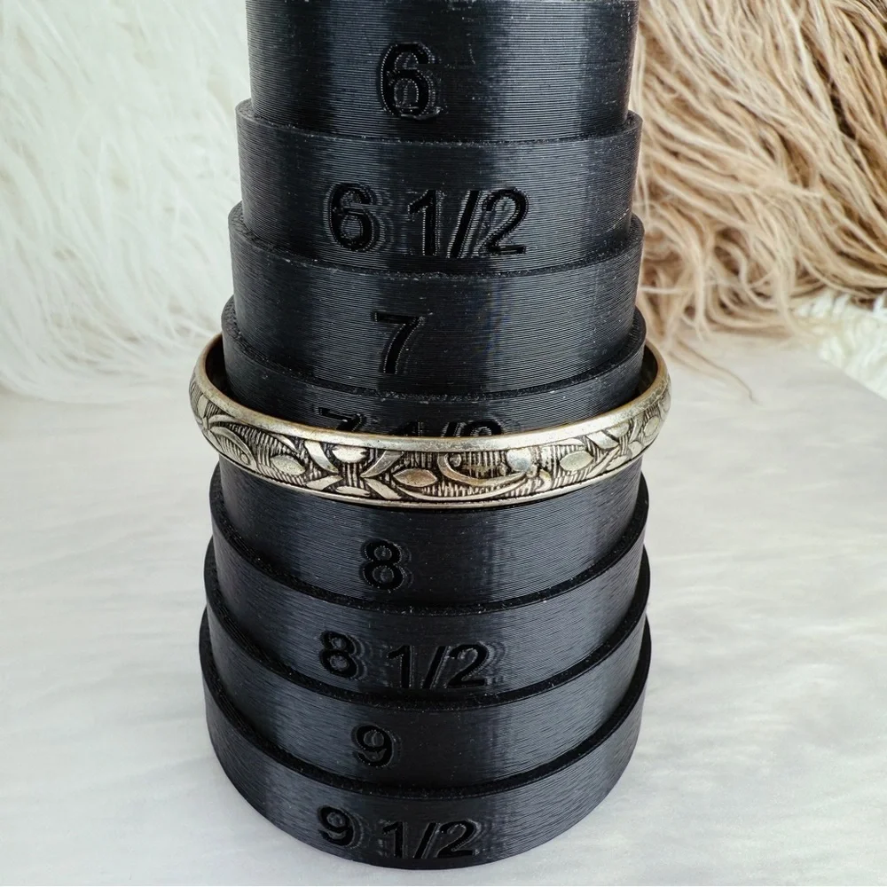 Super lightweight, aged Silvertone etched bangle costume bracelet